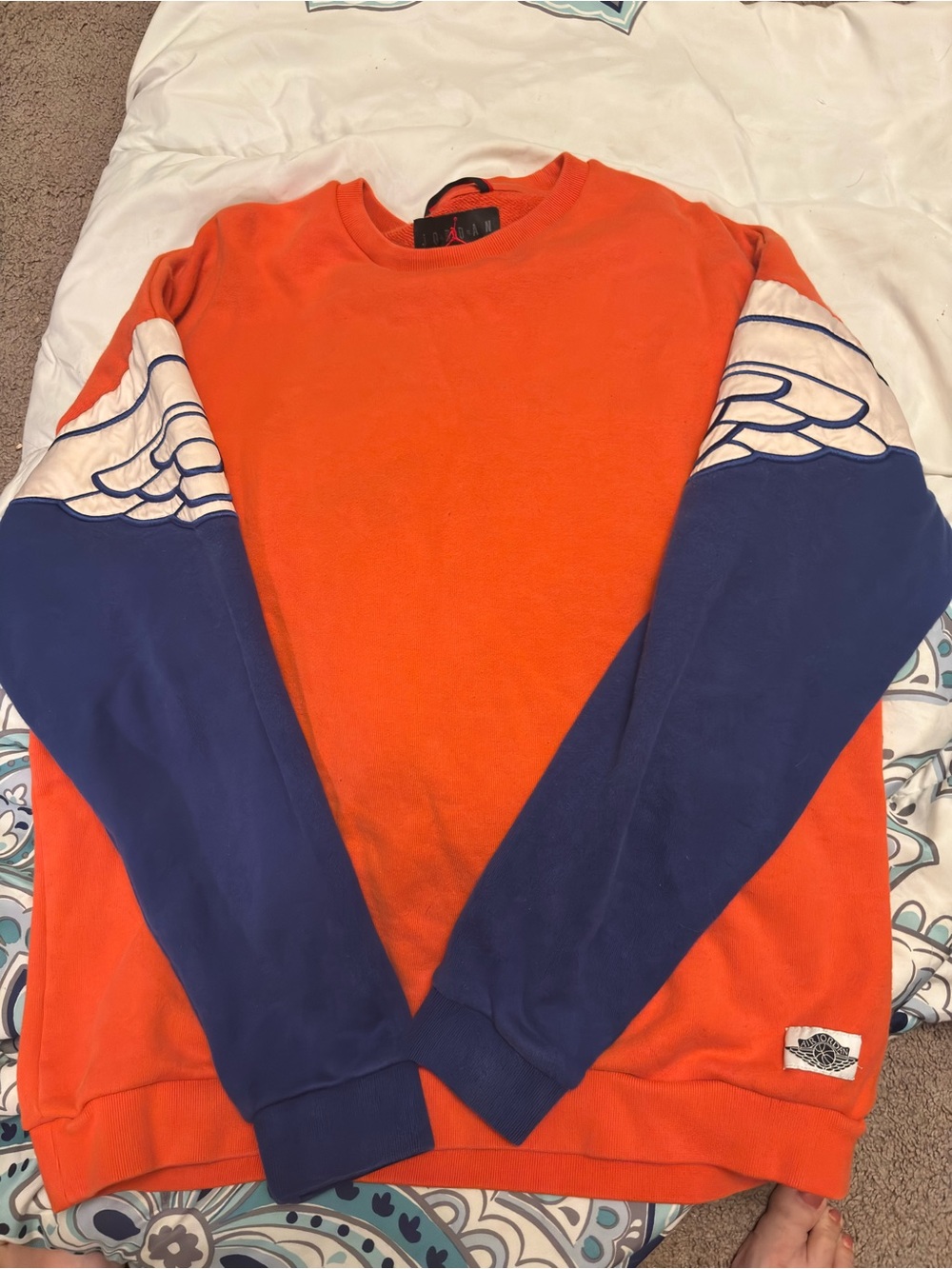 Jordan Orange Crewneck with Blue and White Wing Detailing